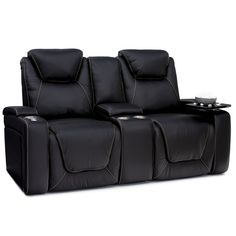 a black leather reclining sofa with two seats and a tray on the armrests