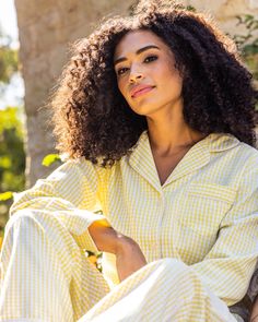 This pajama set is classic and never goes out of style. Gingham print dating back to the 17th century is a staple. This classic pajama set is accented with white piping and finished with pearl buttons. The fabric is made from 100% of the finest quality cotton. It is yarn-dyed to prevent fade and brushed for added softness, making the sleepwear feel absolutely luxurious, getting cozier with each wash. You will be tucked in luxury and off to dreamland. Bonne nuit. Gingham Long Sleeve Sleepwear For Loungewear, Long Sleeve Gingham Sleepwear For Loungewear, Spring Plaid Sleepwear, Gingham Sleepwear For Spring Bedtime, Spring Gingham Sleepwear For Bedtime, Gingham Sleepwear For Bedtime In Spring, Classic Sleepwear For Pajama Party In Spring, Classic Spring Sleepwear For Bedtime, Yellow Gingham