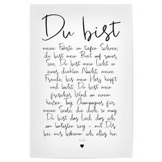 a piece of paper with the words du bist written in cursive writing