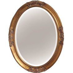 an ornate gold framed mirror on a white background