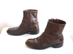 1960s 70s chelsea Beatle Boots Men's size 8.5 EE.  PLEASE consult measurements for best fit! Interior sole length - 10 3/4 inches Width at widest - 4 1/4 inches Heel - 1 1/4 inches brown leather upper Great condition! Some general and normal wear, including some subtle cracking along the toes.  Nothing major! SantaFe1 Vintage Brown Leather Chelsea Boots, Beatle Boots, Chelsea Boots Mens, Buckle Boots, Boots Brown, 4 Inch Heels, Brown Boots, Boots Men, Vintage Men