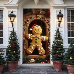 a gingerbread man is on the front door of a house