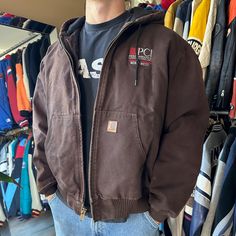 *Size men's XL, refer to measurements *In great condition *Has a slight fade *Had chest logo & small holes on front. *Zipper works great *Has a great boxy fit *Message us any questions Chest: 28.5 in Length: 28.5  in Model 6'1 - 195 Vintage Carhartt Jacket, Carhartt Mens Jacket, Carhartt Jacket, Vintage Carhartt, Carhartt Mens, Men's Coats And Jackets, Mens Coats, Front Zipper, Hooded Jacket