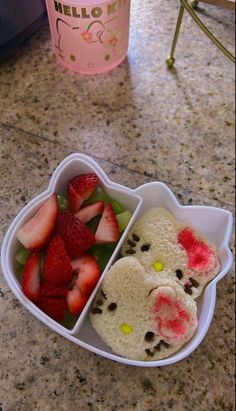 hello kitty bento box with strawberries in it