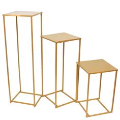 three gold metal and wood side tables with one small table on each side, the other larger