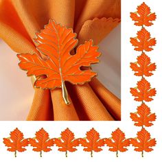 an orange napkin with a maple leaf on it next to a border of other items