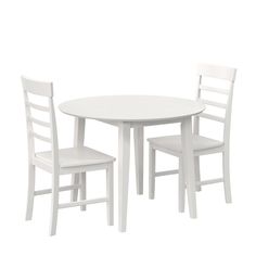 a white table and two chairs sitting next to each other