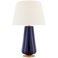 a blue table lamp with a white shade