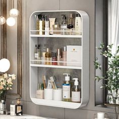 a bathroom with a sink, mirror and shelves filled with personal care products in it