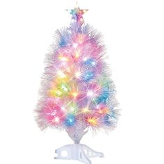 a christmas tree with multicolored lights and a star on it's top