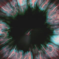 an eyeball with red and blue streaks in the center