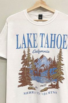 SHORT SLEEVE GARMENT-DYED/MINERAL-WASHED "LAKE TAHOE" OVERSIZED MOUNTAINS/OUTDOORS VINTAGE-INSPIRED GRAPHIC TEE Fabric Contents 100% COTTON Lake Graphic Tee, Camping Graphic Tee, Tee Shirt Outfit Ideas, Graphic Tee Shirt Outfit, Outfit Ideas Shirt, Patagonia Tshirt, Mountain T Shirt, Shirt Outfit Ideas, Mountain Graphic Tee