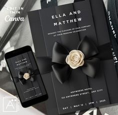 a black and white wedding card with a rose in the center on it next to an iphone