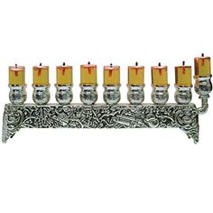 a silver and gold menorah with seven candles