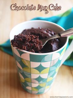 chocolate mug cake in a paper cup with a spoon