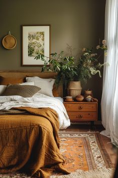 a bed sitting in a bedroom next to a window with curtains on the windowsill