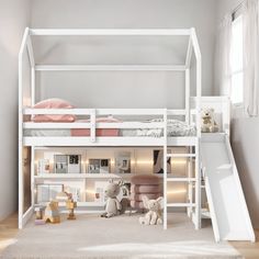 there is a bunk bed with a slide in the middle and toys on the floor