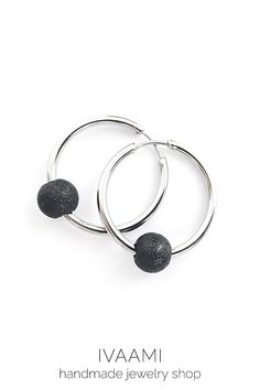 Single black bead hoop earring with hinged closure. The earring can be worn two ways, with or without the textured finish bead removable charm. All parts of the earring are stainless steel, which is hypoallergenic and won’t tarnish or discolor over time. #etsy #hoopearrings #blackearrings #punkearrings #punkjewelry #emoearrings #emojewelry #egirlearrings #egirljewelry #grungehoopearrings #grungeearrings #eboyearrings #silverhoopearrings Egirl Earrings, Egirl Jewelry, Emo Jewelry, Grunge Earrings, Bead Hoop Earrings, Punk Earrings, Mixed Metal Earrings, Asymmetrical Earrings, E Boy