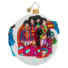 a glass ornament with the beatles on it