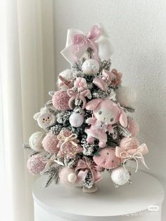 a small christmas tree made out of stuffed animals