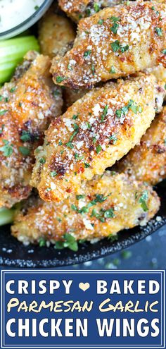 crispy baked parmesan garlic chicken wings on a plate with celery