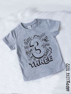 Your little boy is turning THREE and we want to Celebrate! This tee will surely be the life of the party! ** THE DEETS ** + Super Fast Shipping + Super Soft and great quality + These run very true to size and not big! If your child is in between sizes I recommend sizing up. ** CARE INSTRUCTIONS** + My tees are easy wash and wear + No special care needed. All Happy Life Tee sales are final; I'm happy to answer sizing or any other questions ahead of time, just send me a message! Thank you so much Happy 3rd Birthday Boy, 3rd Birthday Boy, 3rd Birthday Shirt, 3rd Birthday Boys, Third Birthday Shirt, Happy 3rd Birthday, Baby Boy Birthday, Birthday Boy Shirts, Boy Shirt