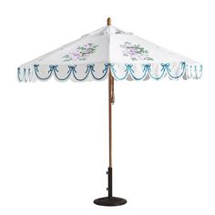 an umbrella with blue trim and flowers on it