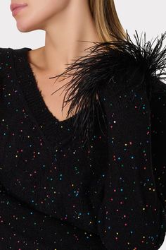 This luxe, relaxed fit V-neck sweater is embellished with feather detail at the sleeves. This season, it’s offered with rainbow sequin detail throughout. Style it with your favorite MILLY pant or mini skirt.