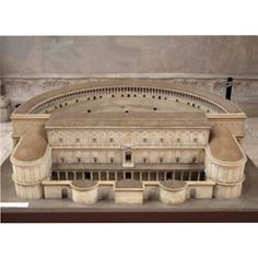 an architectural model of a building on display