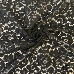 black and white lace fabric with an intricate design