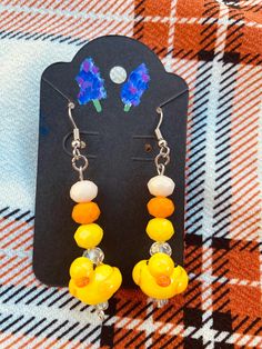 Every thought that normal earrings are boring? Same here! I mean, who can resist Duck earrings? I even made a pair for myself! It's a perfect unique gift idea for someone who just doesn't like bland or boring jewelry. The holidays are coming up and this would be a great gift! Yellow Handmade Novelty Jewelry, Duck Earrings, Funky Yellow Handmade Earrings, Playful Yellow Dangle Earrings, Rubber Duck Earrings, Rubber Duck, Earrings Handmade, Jewelry Gifts, Favorite Jewelry