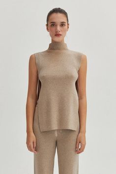 Indulge in luxurious style with our Molly Mock Neck Sweater Knit Top. This elegant top features a sophisticated mock neck design that adds a touch of refinement to any outfit. The soft, knit material provides both comfort and style, making it perfect... Lounge Cardigan, Mock Neck Tank Top, Mock Neck Tank, Mock Neck Top, Mock Neck Sweater, Basic Tops, Sweater Knit, S Models, Neck Designs