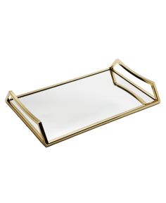 a gold tray with two handles and a white plate on the bottom that has a rectangular edge