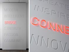 there are two different types of neon signs on the wall, one is white and the other is red