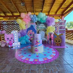 a birthday party with balloons and decorations