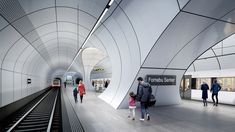 people are walking through the subway station