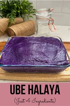 a purple cake sitting on top of a wooden cutting board