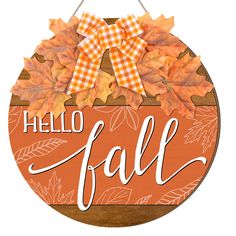 a wooden sign that says hello fall