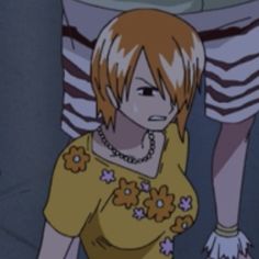 an anime character with blonde hair wearing a yellow shirt and flowered skirt, standing next to another person