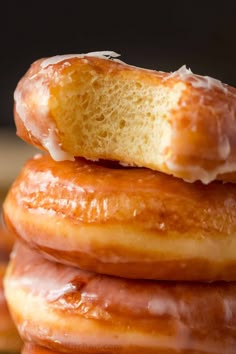 three glazed donuts stacked on top of each other