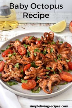 baby octopi on a plate with grape tomatoes and parsley. Small Octopus Recipe, Octopus Recipes Easy, Baby Octopus Recipe, Cuttlefish Recipes, Octopus Dish, How To Cook Octopus, Gratin Recipes, Small Octopus