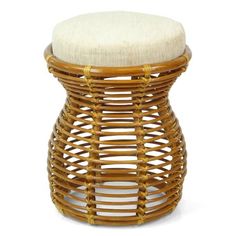 a wicker stool with a white cushion on the top and bottom part of it