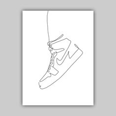 a black and white drawing of a shoe