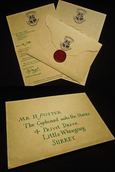 three harry potter envelopes are on display