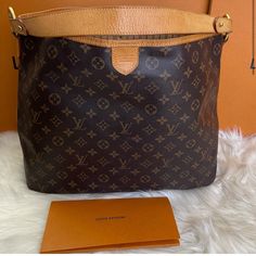 Hi There! This Listing Is For An Authentic Louis Vuitton Hobo Style Bag In Classic Monogram Print. Photos Show The Wear / Minor Scratches To The Hardware And Leather (Small Imperfections In Trim, Bottom Corners, Minor Stains Inside). No Odors, Just Too Big For What I Need And I Am Cleaning Out My Closet! I Am Shipping From An Apo, So Please Be Patient! I Also Purchased A Crossbody Strap For The Bag, Which Can Be Added For An Additional Cost (If You’re Interested!) 7.87” X 11.81” X 20.47” Louis Vuitton Hobo Bag, Louis Vuitton Hobo, Print Photos, Classic Monogram, Hobo Style, Be Patient, Monogram Prints, What I Need, Hi There