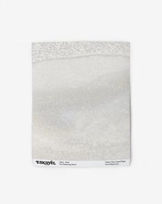 a white towel on top of a white surface with the words,'seaweed'in