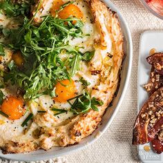 an image of food that is in the bowl and on the plate next to it