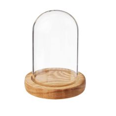 a wooden stand with a glass dome on it