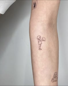 a person with a small tattoo on their arm