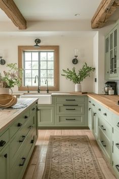 Olive Green Farmhouse Kitchen, White Walls Green Cabinets, Sage Green Rustic Kitchen, Sage Green Cabinets With Black Hardware, Sage Green Base Cabinets Kitchen, Green Kitchen Cabinets White Appliances, Kitchen With Sage Green Accents, Sage Colored Kitchen Cabinets, Kitchen Ideas Olive Green